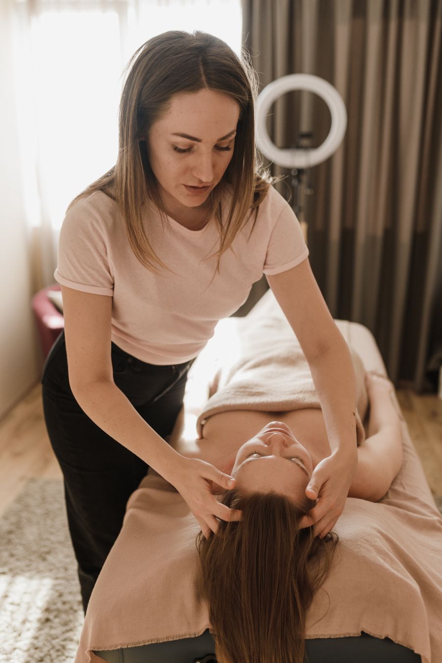 Client enjoying a relaxing head massage